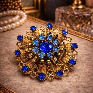 VINTAGE 1950s LARGE GOLD TONE BROOCH BLUE RHINESTONES STARBURST PIN